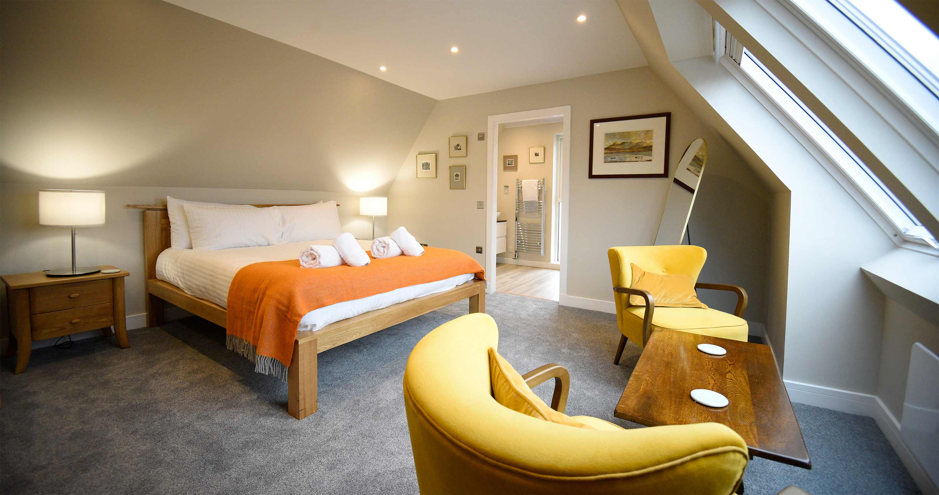 Enjoy a spacious master bedroom with king size bed and en suite shower room at The Old Workshop self catering accommodation